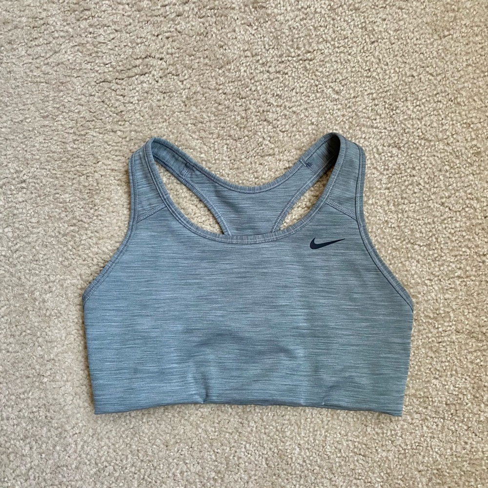 Nike Women’s size medium olive green sports bra. Never worn.